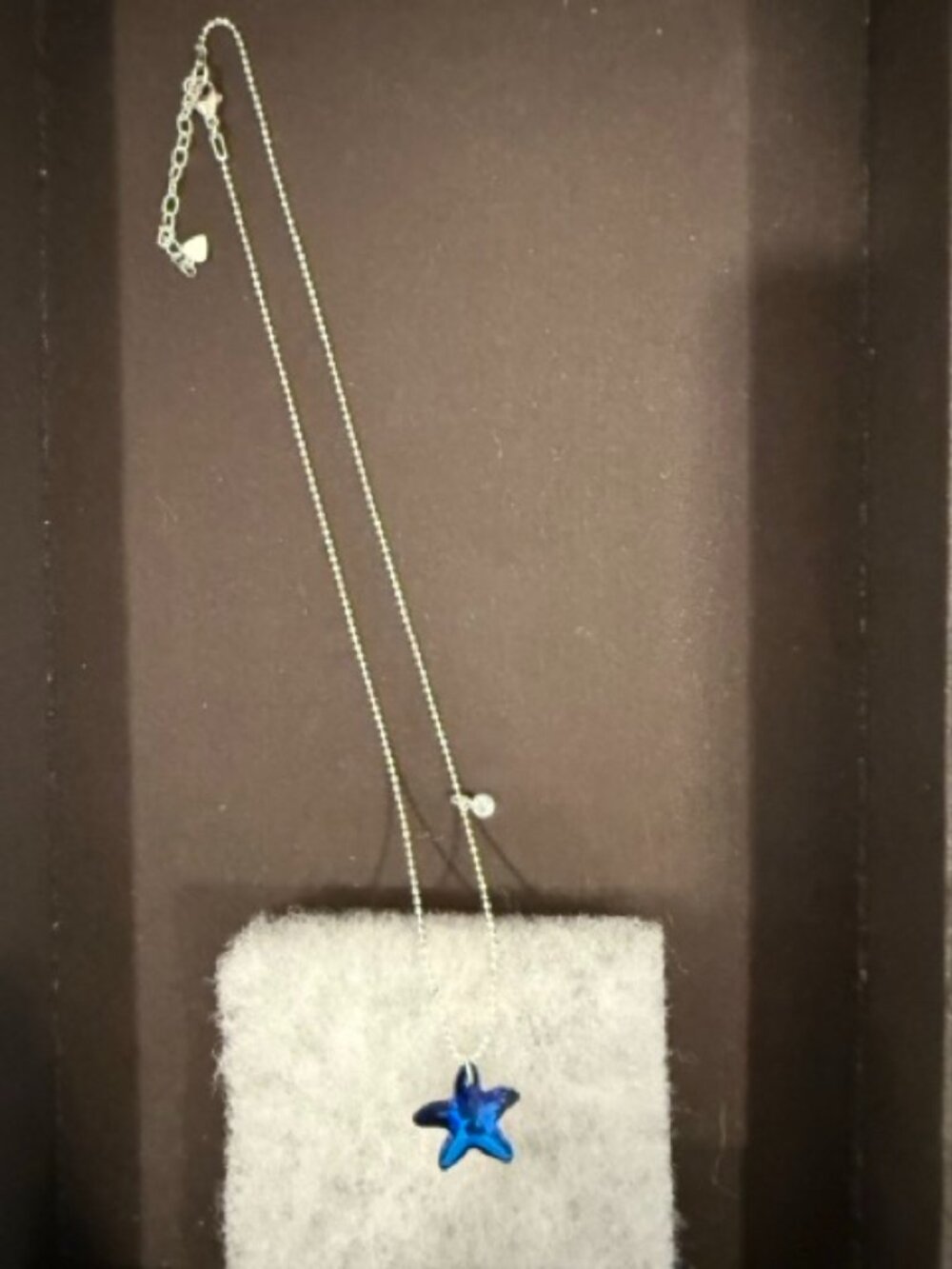 Swarovski Crystal Blue Starfish on a delicate sterling silver 18" -20" chain.